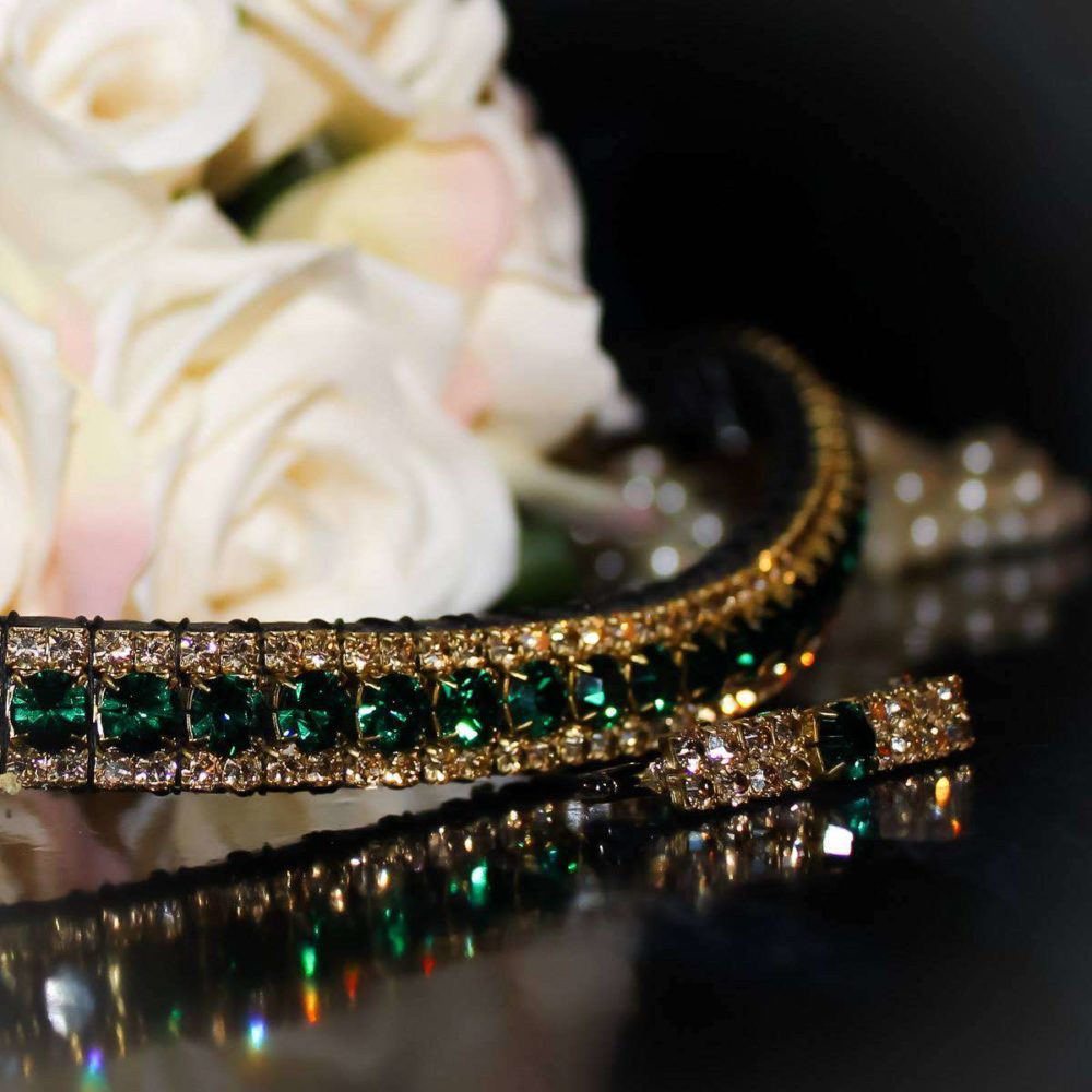 Emerald and golden honey classy antique look browband from PonyCouture's Triple Crown range of handmade crystal browbands with a golden browband and green browband and on a black back ground with matching stock pin