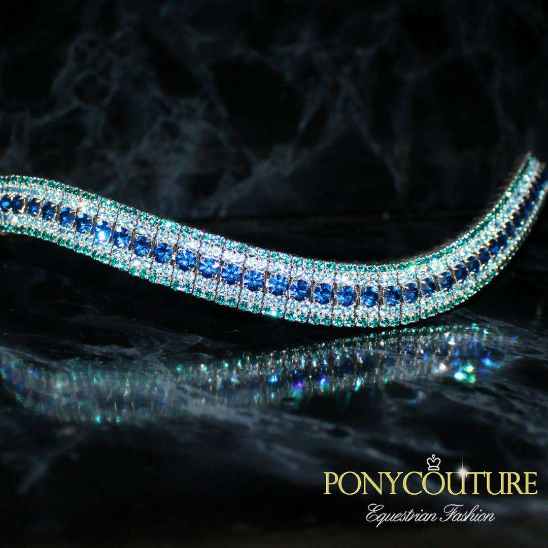 wave shape bling browbands with aqua blue browbands and on a black back ground these blue browbands are used for dressage and showjumping and dressur